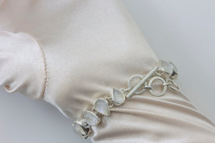 Moonstone Bracelet Bezel Set Sterling Silver Smooth Rainbow 7 to 7 3/4 Inches Natural Rainbow Blue Flash Adjustable Toggle Clasp Pear Shape